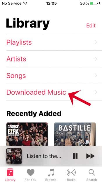 An arrow points at the folder "Downloaded Music" in the Music Library