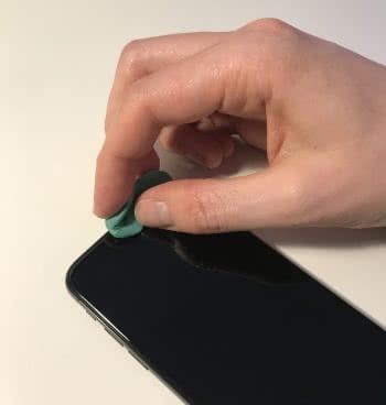 iphone cleaner that sticks on phone